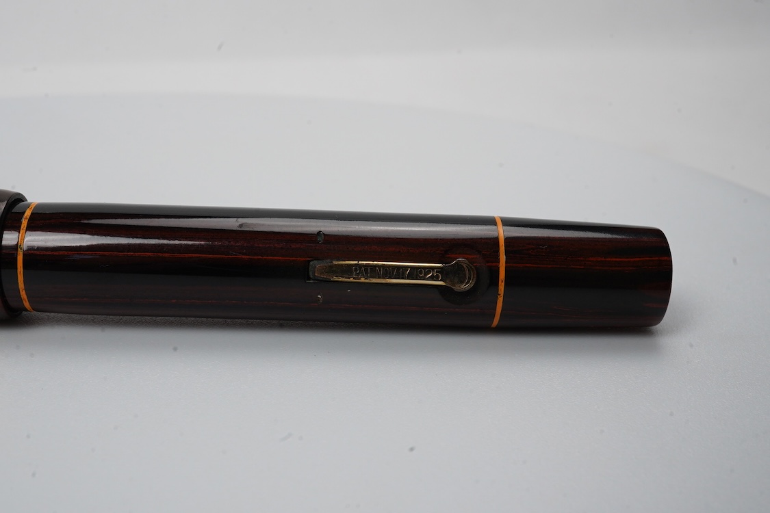 A Conklin Endura woodgrain lever filler fountain pen in near mint condition